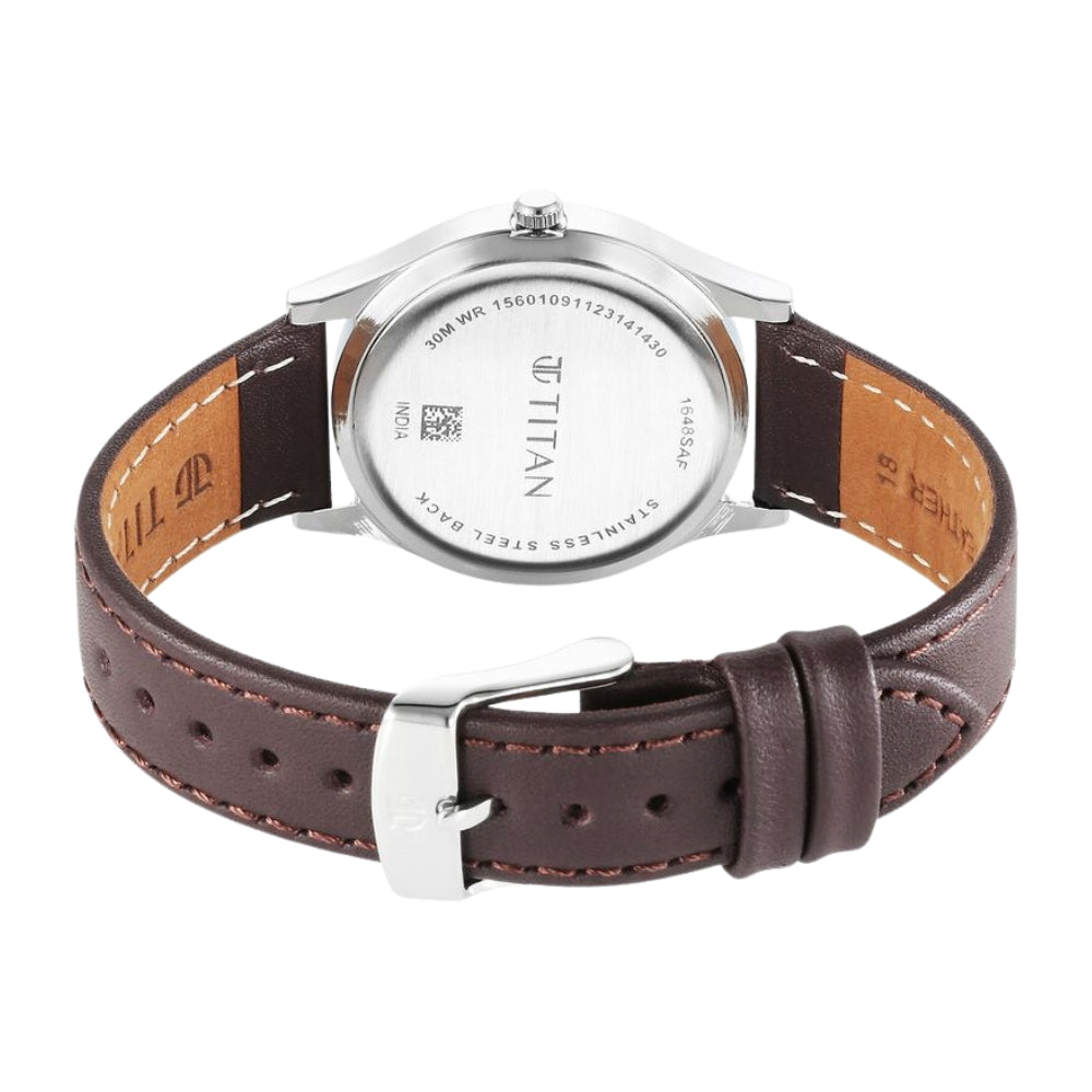 Titan Karishma Zing Quartz Analog Blue Dial Leather Strap Watch for Men 1648SL01