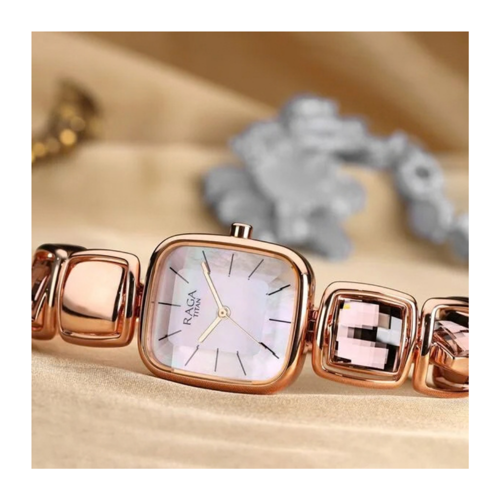 Titan Raga Moments of Joy Mother of Pearl Dial Analog Rose Gold Metal Strap watch for Women 95136WM01