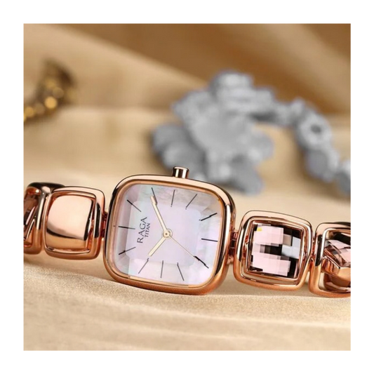 Titan Raga Moments of Joy Mother of Pearl Dial Analog Rose Gold Metal Strap watch for Women 95136WM01